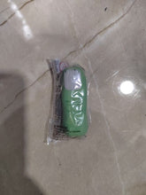 Charger l'image dans la galerie, Gomme parfumée en forme de doigt de monstre vert Legami sous son emballage plastique scellé.