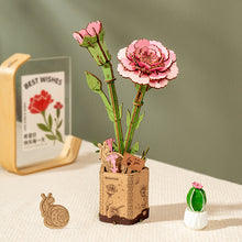 Charger l'image dans la galerie, Rowood Pink Carnation - Fleur en bois dans son pot en papier
